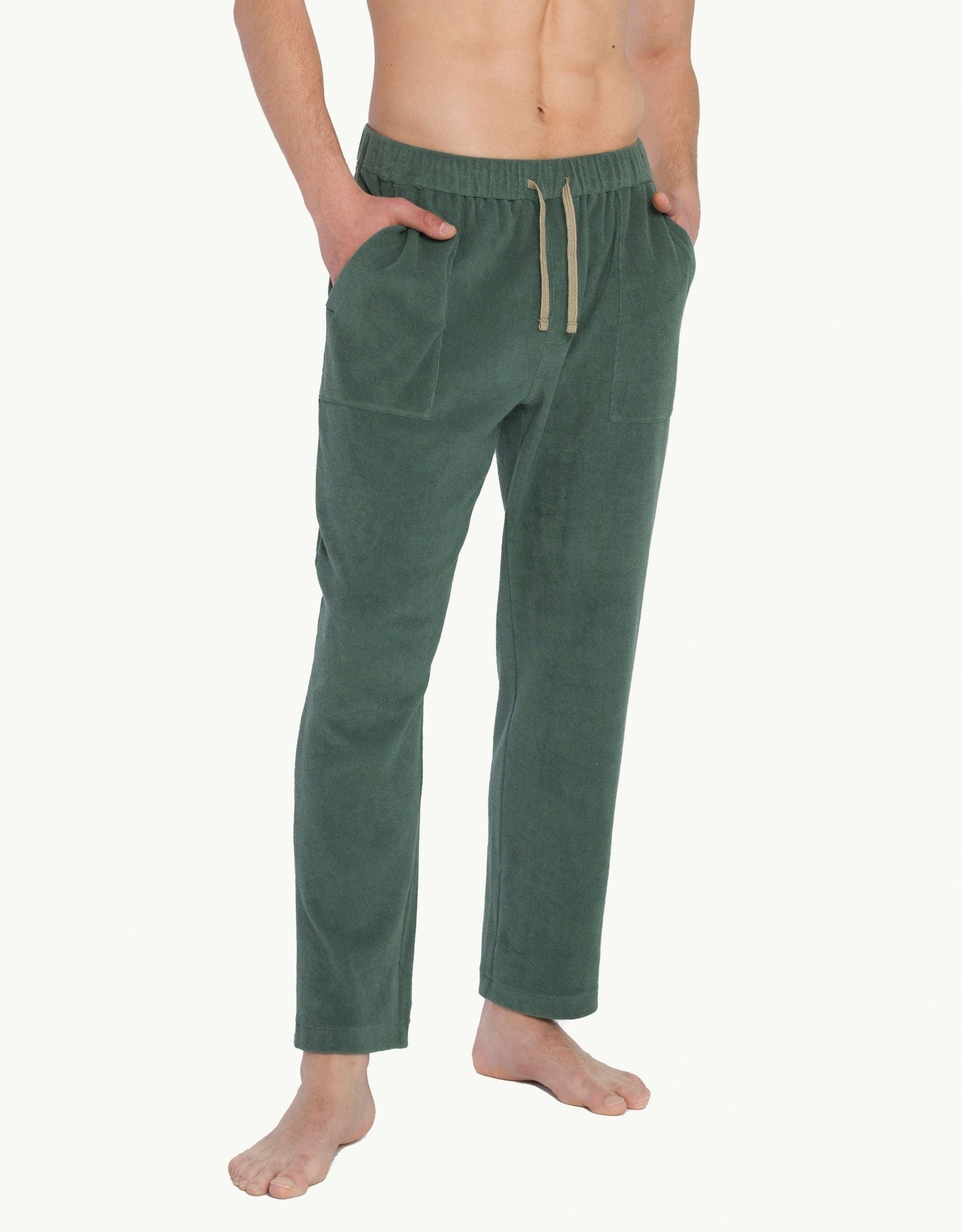 Versatile summer luxury pants with a towel-like feel, ideal for beach getaways or nights out. Made from 100% certified organic cotton in green.