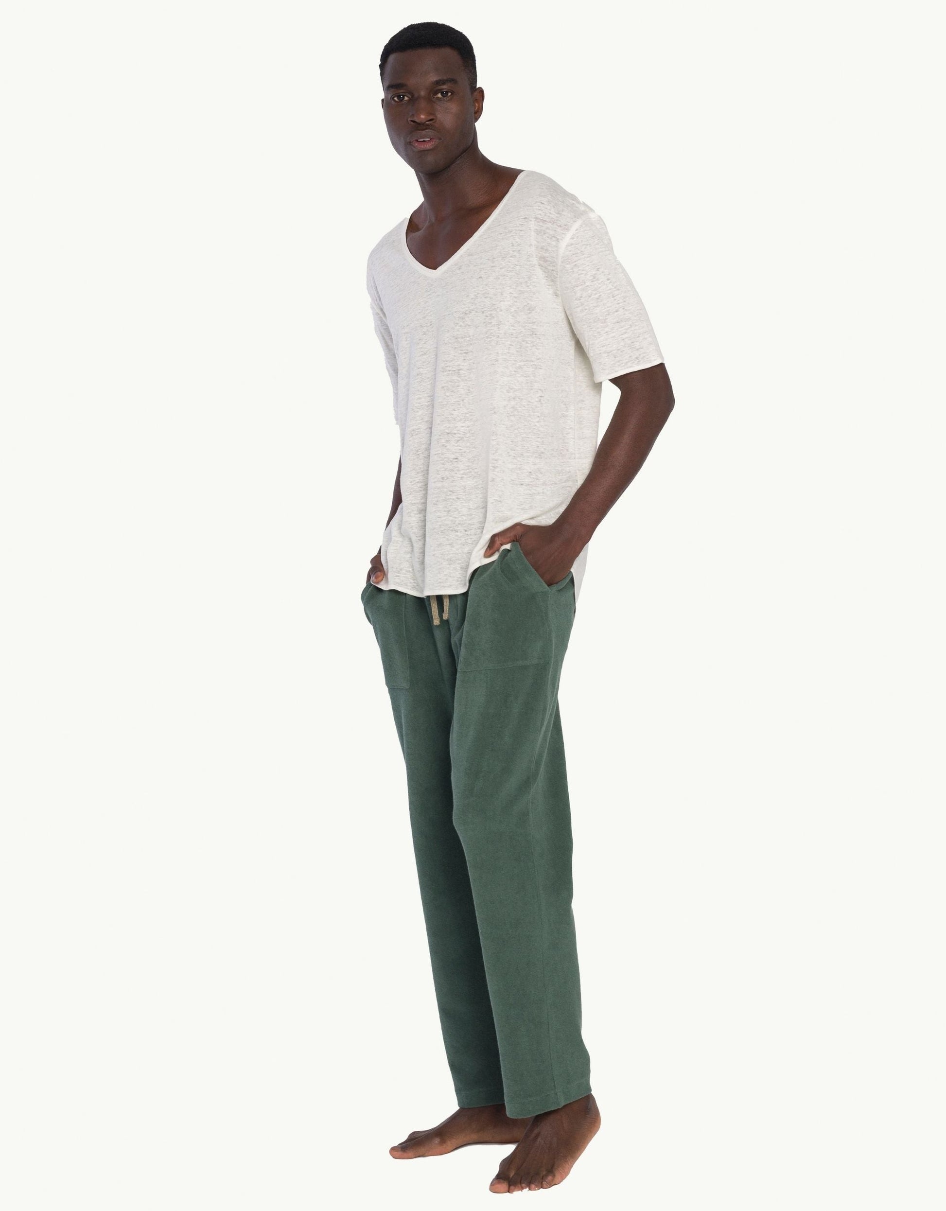 Versatile summer luxury pants with a towel-like feel, ideal for beach getaways or nights out. Made from 100% certified organic cotton in green.