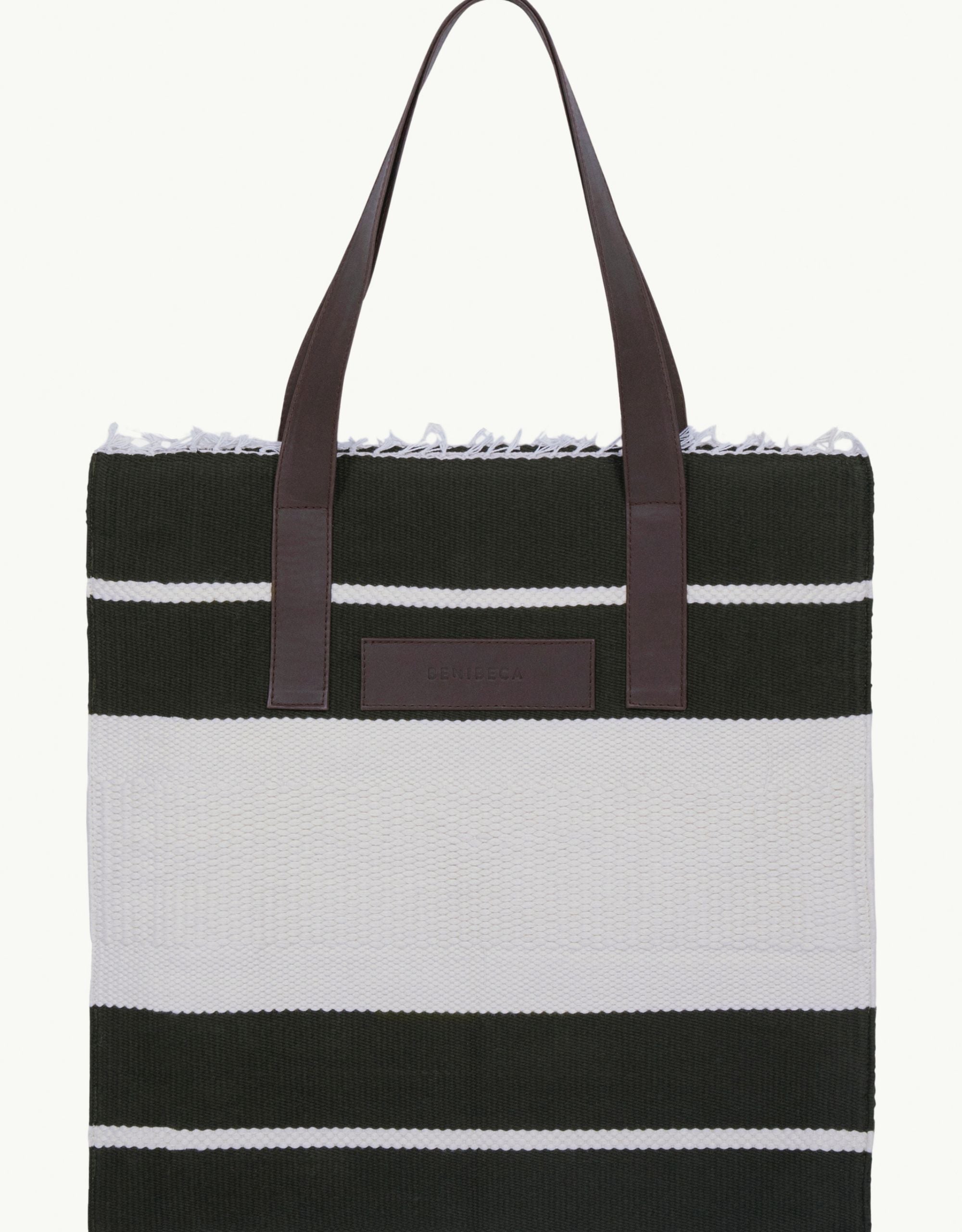 Explore our handcrafted tote bag, inspired by Peruvian artisanship. This two-tone cotton weave tote showcases naturally tanned crust cowhide and tocuyo cotton lining, complete with dual compartments and pockets for practical elegance. Browse our selection of Peruvian artisan tote bags.